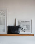 Black minimalist Wrist bag | Clutch Leather Bag | Full grain leather handbag