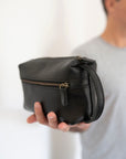 Full grain leather necessaire. Essential travel accessory. Small makeup bag
It is lined with cotton fabric. Wide-open interior for easy access to toiletries and other daily essentials. Featuring two zippered exterior pockets.