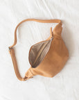Leather Fanny Pack handmade with full-grain vegetable-tanned leather dyed using natural pigments to ensure our pieces are environmentally friendly.
Our leathers are achieved naturally. They are not painted, and no industrial process has been applied to them to neutralize their marks. The color of our leather accessories may vary slightly from one batch to another.