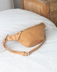 Leather Fanny Pack handmade with full-grain vegetable-tanned leather dyed using natural pigments to ensure our pieces are environmentally friendly.
Our leathers are achieved naturally. They are not painted, and no industrial process has been applied to them to neutralize their marks. The color of our leather accessories may vary slightly from one batch to another.