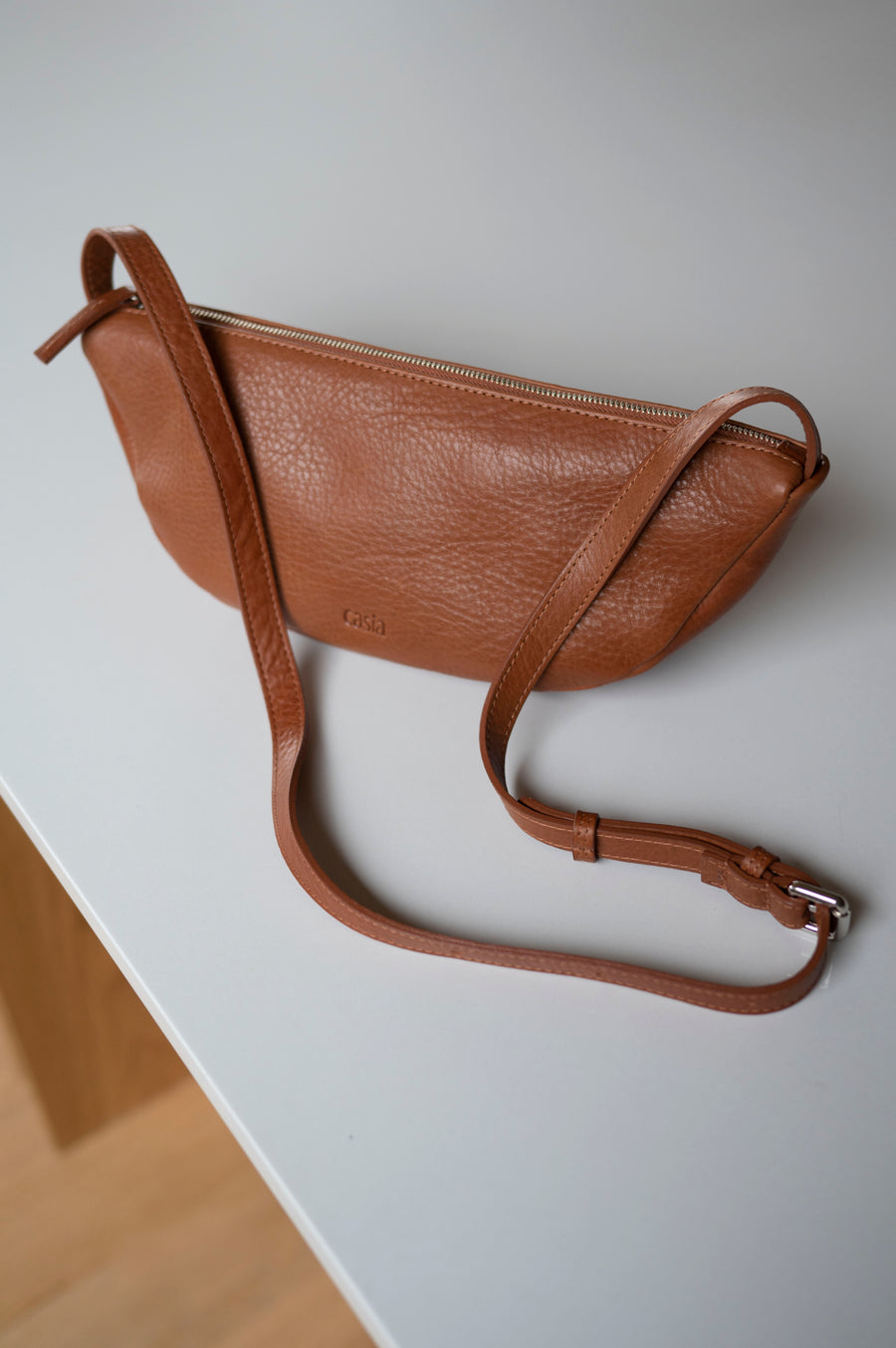 Sling leather bag - vegetable tanned leather