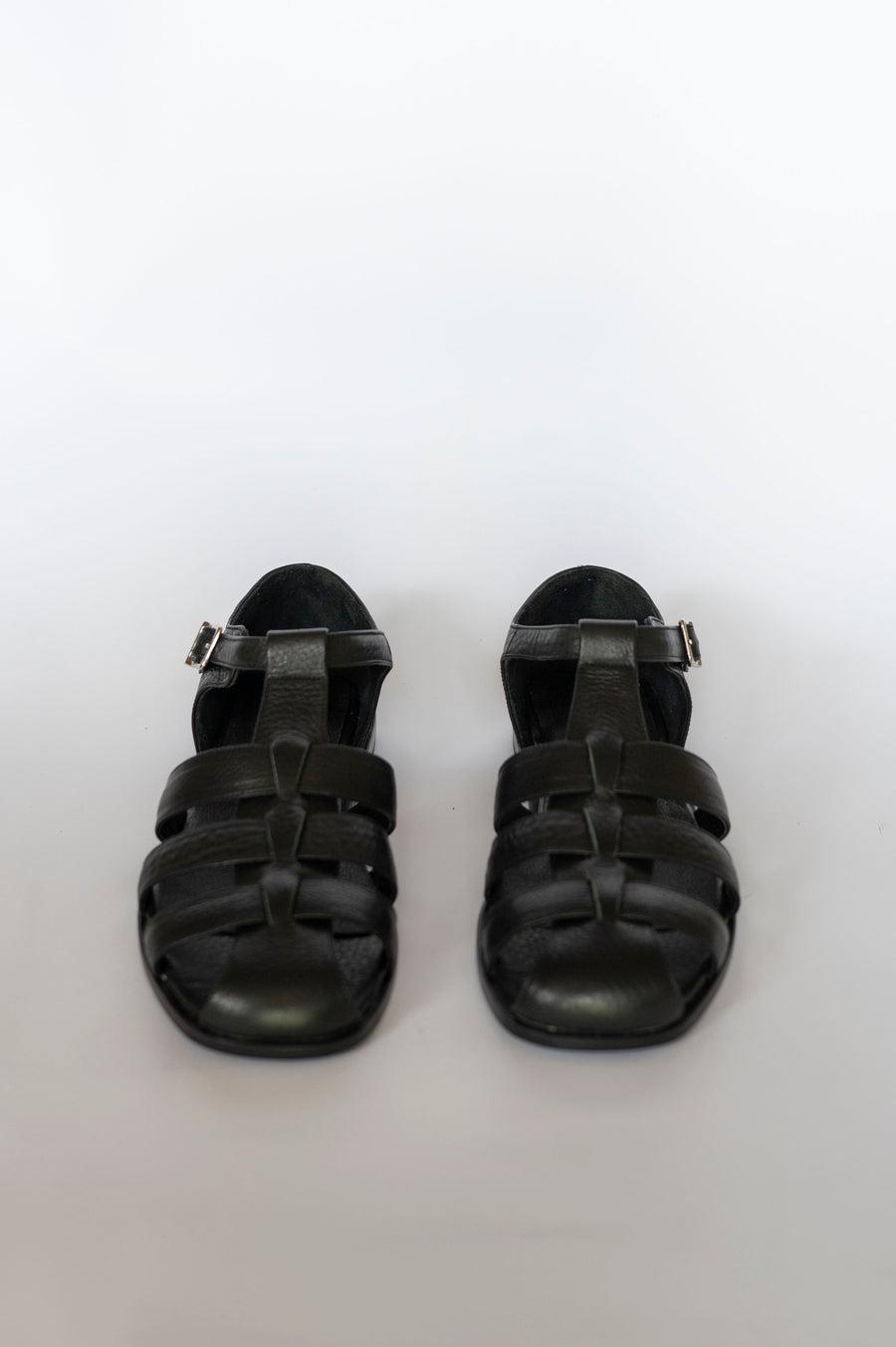 black leather sandals for women front