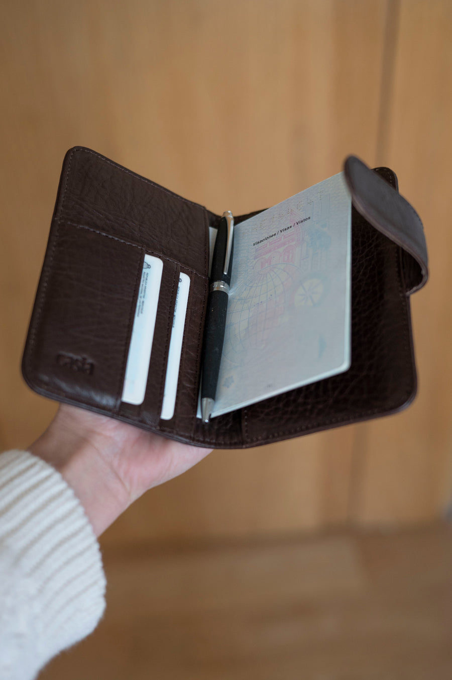 Leather passport holder interior, card slot and pocket. 