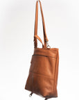 Convertible leather backpack Andes L reconfigured as satchel-tote, side view
