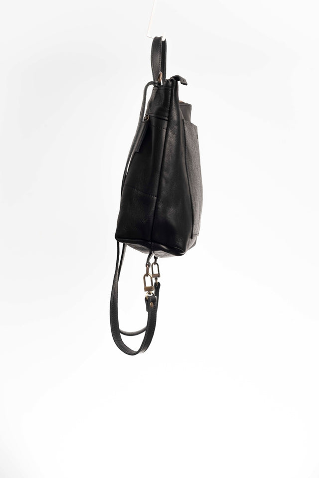 Convertible backpack. Full grain leather backpack. Vegetable tanned leather backpack. Unlined backpack.