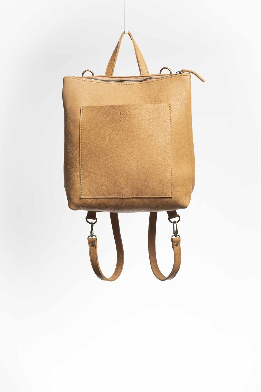 Convertible backpack. Full grain leather backpack. Vegetable tanned leather backpack. Unlined backpack.