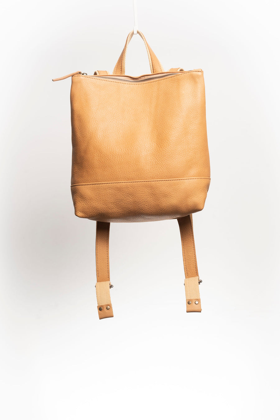 Full grain leather backpack. Vegetable tanned leather backpack. Unlined backpack.