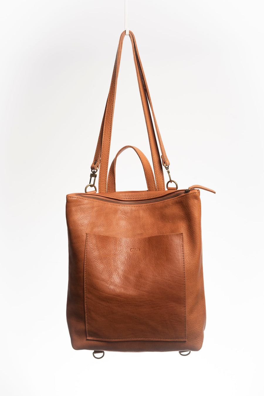 Convertible backpack. Full grain leather backpack. Vegetable tanned leather backpack. Unlined backpack.